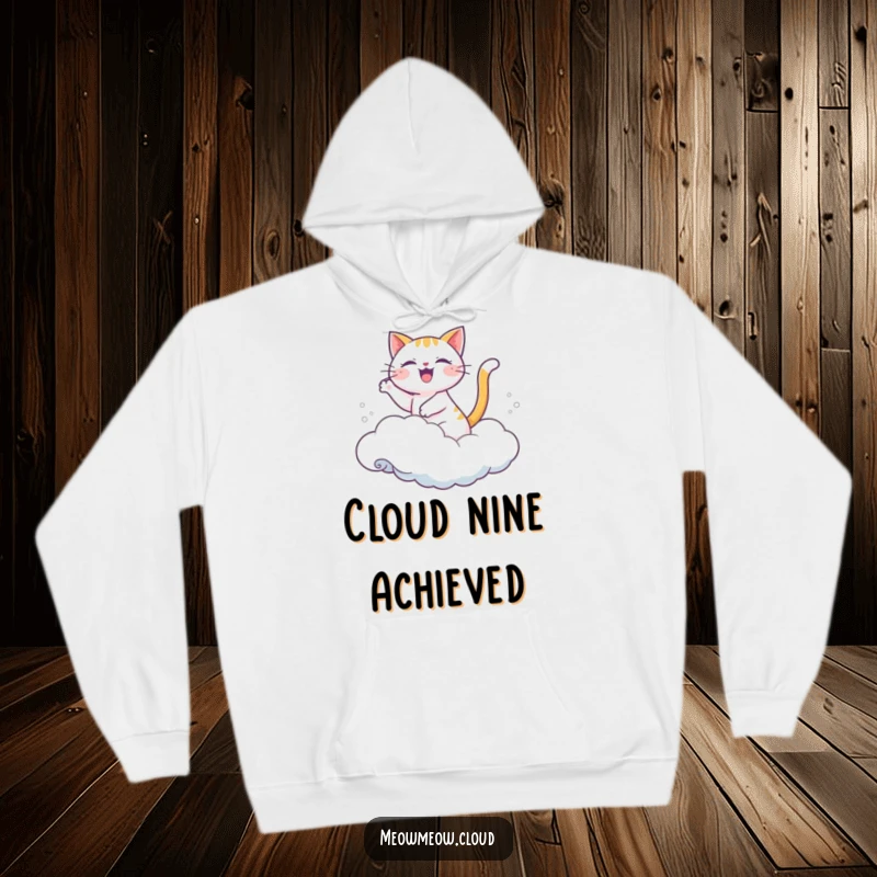 Funny hoodie with a joyful cartoon cat riding a cloud like a wave.