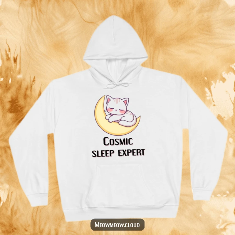 Funny hoodie with an adorable cat character peacefully napping on a crescent moon, exuding warmth and dreamy comfort.