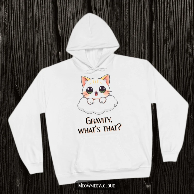 Funny cat hoodie featuring a wide-eyed, surprised cat floating adorably on a cloud, perfect for cozy, humorous wear.