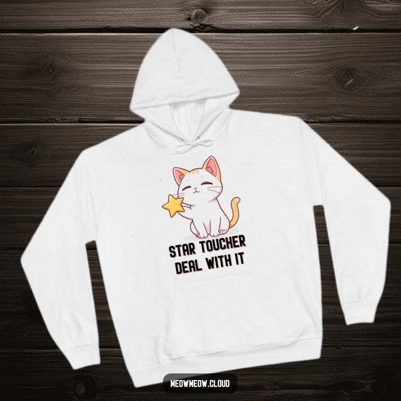 Funny hoodie depicting a clever cat reaching out to poke a bright star in the night sky.