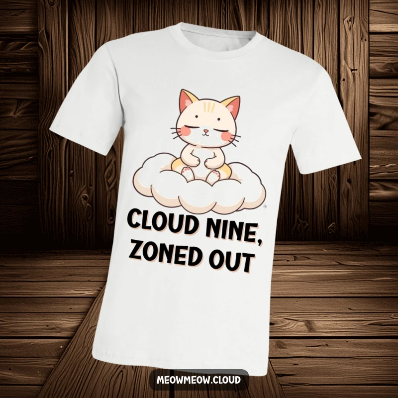 Funny cat meditation t-shirt with a serene cat gracefully meditating on a fluffy cloud cushion, radiating peace.