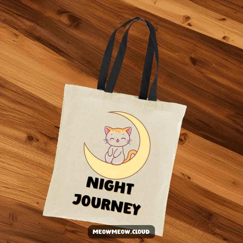 Funny Tote Bag with a smiling cat riding a crescent moon, ideal for carrying essentials with a dose of celestial humor.